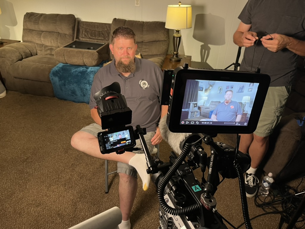 Photo of Wilk Wilkinson being interviewed